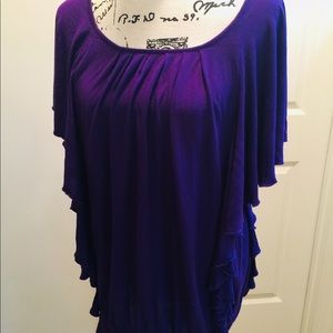 Women’s top with ruffles on each side